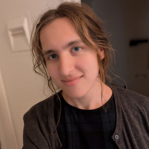 Sam Quinn (they/them)